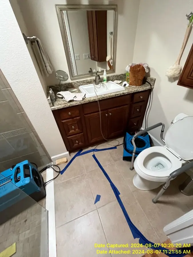 Bathroom dried after a toilet overflow in an Altamonte Springs, FL home